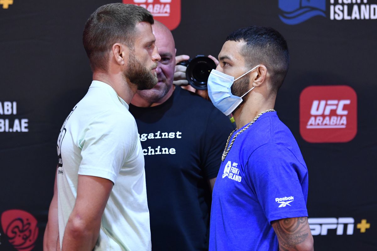 Opponents Calvin Kattar and Dan Ige face off during the UFC Fight Night weigh-in inside Flash Forum on UFC Fight Island on July 14, 2020 in Yas Island, Abu Dhabi, United Arab Emirates.