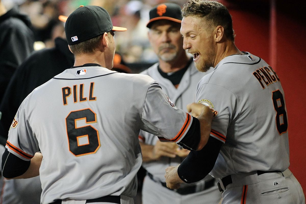 Brett Pill has fun with Hunter Pence's left bicep, nickname: "Fastball, middle in".