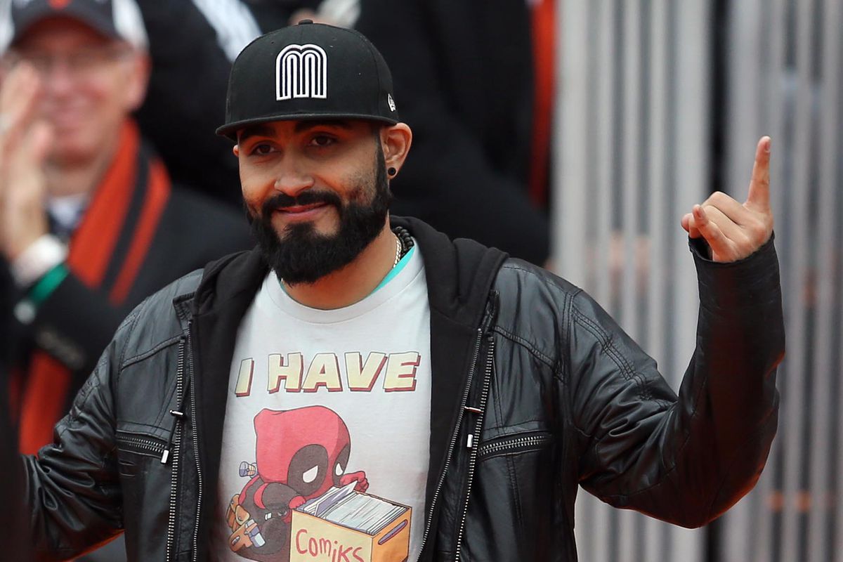 San Francisco Giants pitcher Sergio Romo acknowledges the crowd as they celebrate their World Series championship at Civic Center Plaza in San Francisco, Calif., on Friday, October 31, 2014. (Jane Tyska/Bay Area News Group)