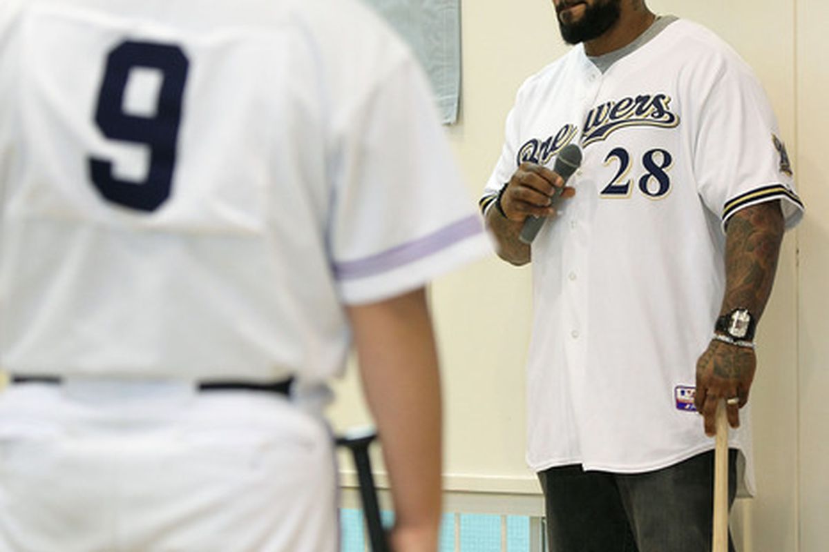 Either Prince Fielder has lost a few pounds, or that headband is slimming.