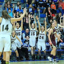 Skyline celebrates as it defeats Maple Mountain Friday, Feb. 20, 2015, in 4A semifinal action at Salt Lake Community College in Taylorsville. Skyline won 56-39.