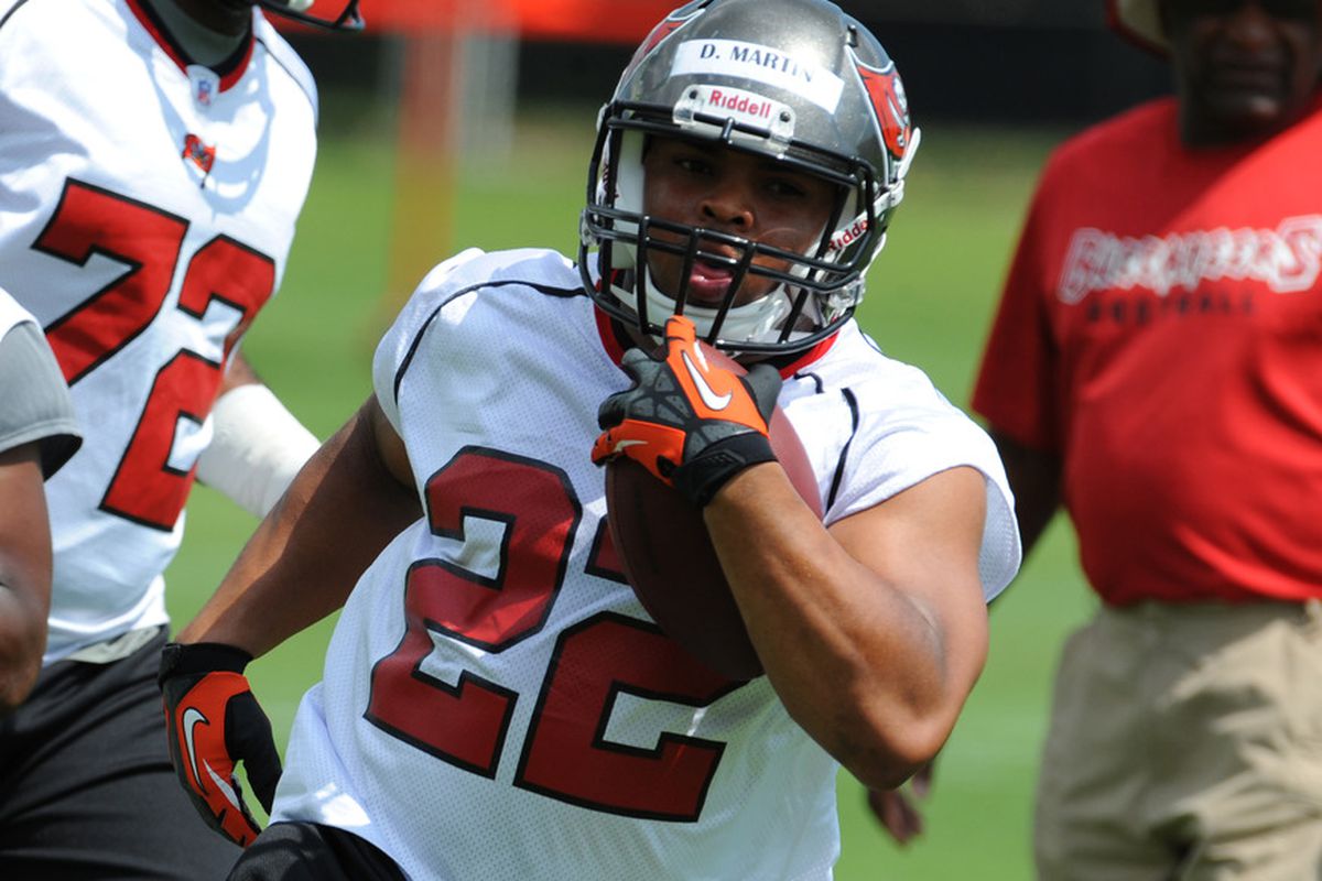 TAMPA, FL -  MAY 4: Running back Doug Martin #22 of the Tampa Bay Buccaneers rushes upfield during a rookie practice at the Buccaneers practice facility May 4, 2012 in Tampa, Florida. (Photo by Al Messerschmidt/Getty Images)