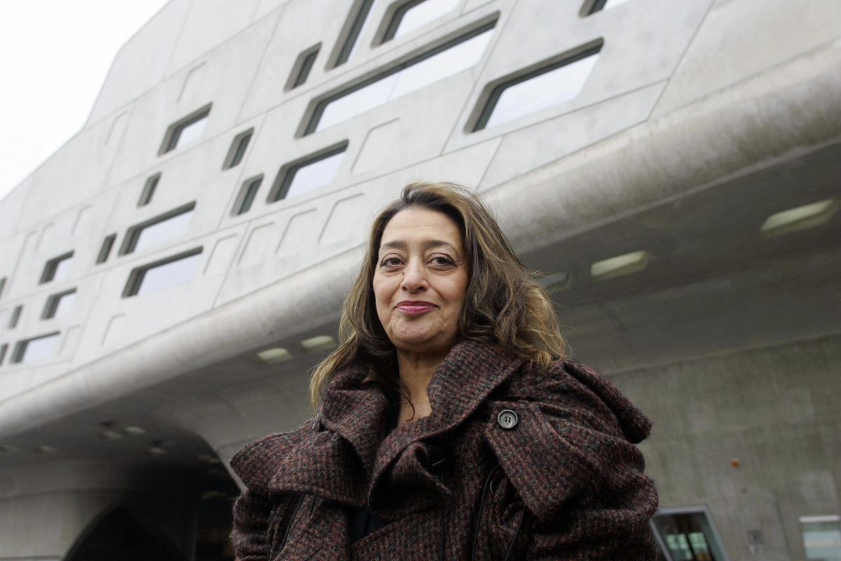 Zaha Hadid poses in front of the Phaeno Science Center in Wolfsburg, Germany, which she designed, in 2005. 