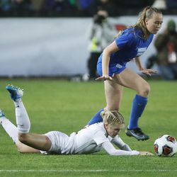 Brigham Young Cougars midfielder Olivia Smith (2) and Florida State Seminoles Jenna Nighswonger get tangled during the NCAA national soccer championship at Stevens Stadium at Santa Clara University in Santa Clara, Calif. on Monday, Dec. 6, 2021. BYU lost in overtime penalty kicks.