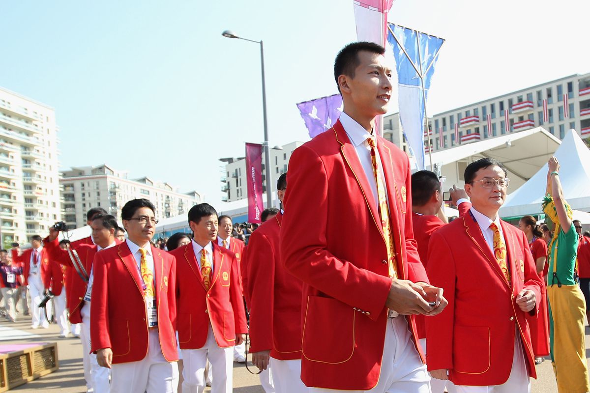 As is becoming tradition, a male Chinese basketball player will be the flag bearer for in the Opening Ceremonies. Yi Jianlian might fit the bill to represent the fourth-largest delegation of 380 athletes.  (Photo by Feng Li/Getty Images)