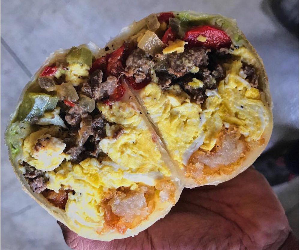 Close up of breakfast burrito.
