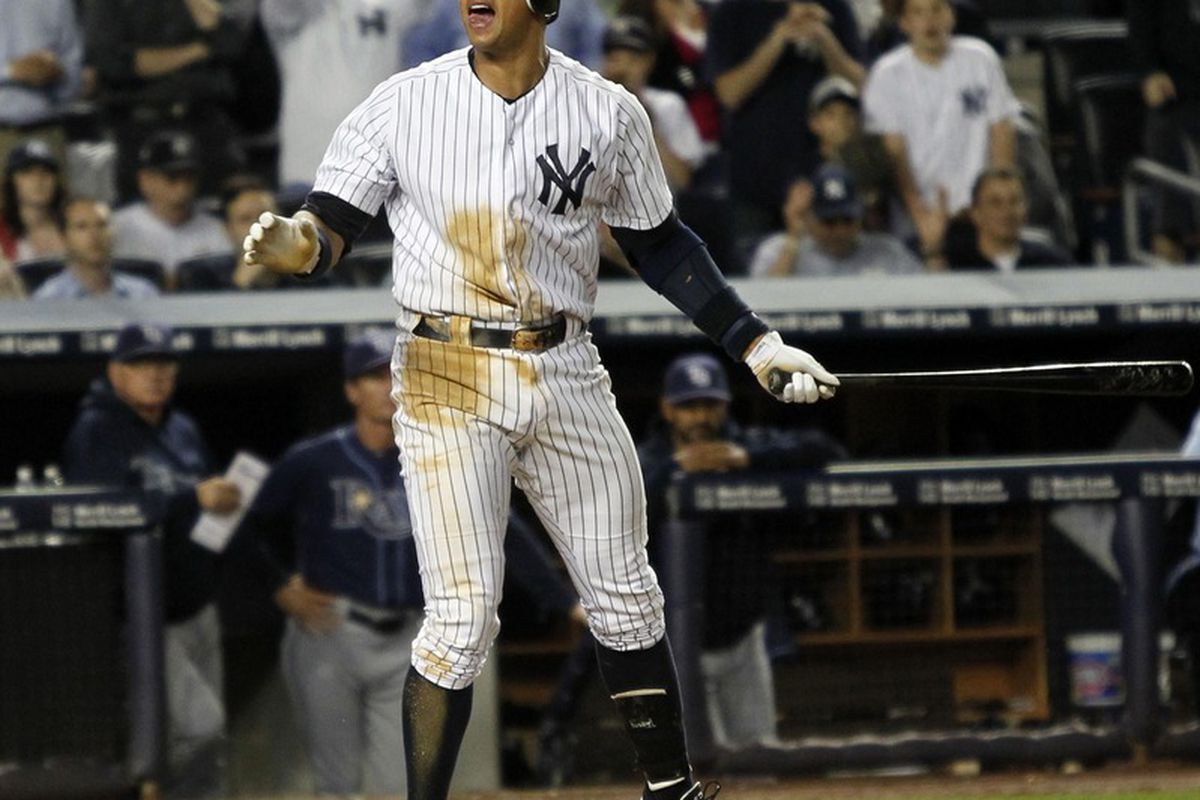 June 7, 2012; Bronx, NY, USA; New York Yankees third baseman Alex Rodriguez reacts after striking out in the 5th inning of the game against the Tampa Bay Rays at Yankee Stadium.  Mandatory Credit: Tim Farrell/THE-STAR LEDGER via US PRESSWIRE