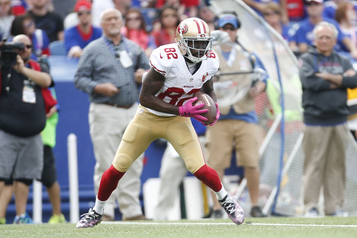 Former NFL wide receiver Torrey Smith running with the ball during his time with the San Francisco 49ers