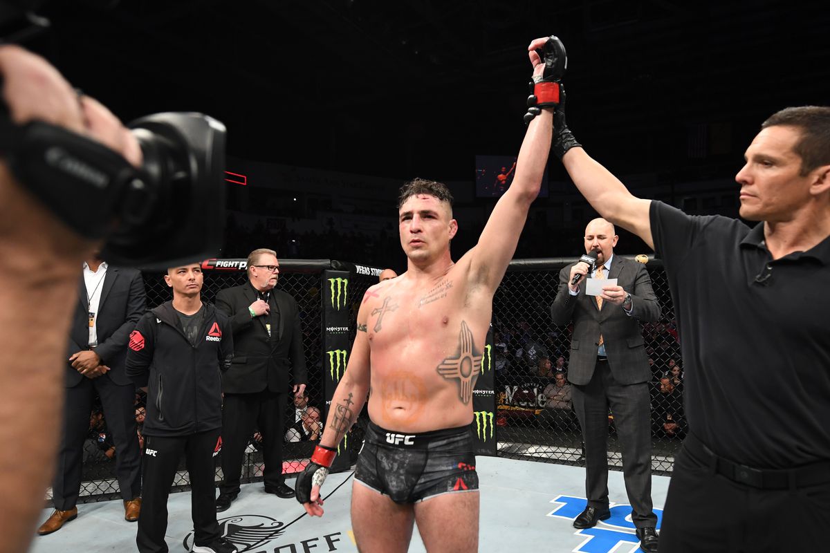 Diego Sanchez is declared the winner after Michel Pereira is disqualified for an illegal knee in their welterweight bout during the UFC Fight Night event at Santa Ana Star Center on February 15, 2020 in Rio Rancho, New Mexico.