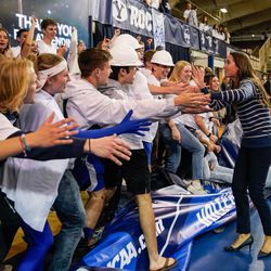 BYU women’s volleyball head coach Heather Olmstead celebrates after winning against Utah in an NCAA volleyball game at Smith Fieldhouse in Provo on Saturday, Dec. 4, 2021.