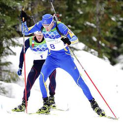 Sweden's Bjorn Ferry, right, and France's Vincent Jay compete in the men's biathlon 12.5 km pursuit at Whistler Olympic Park Tuesday.