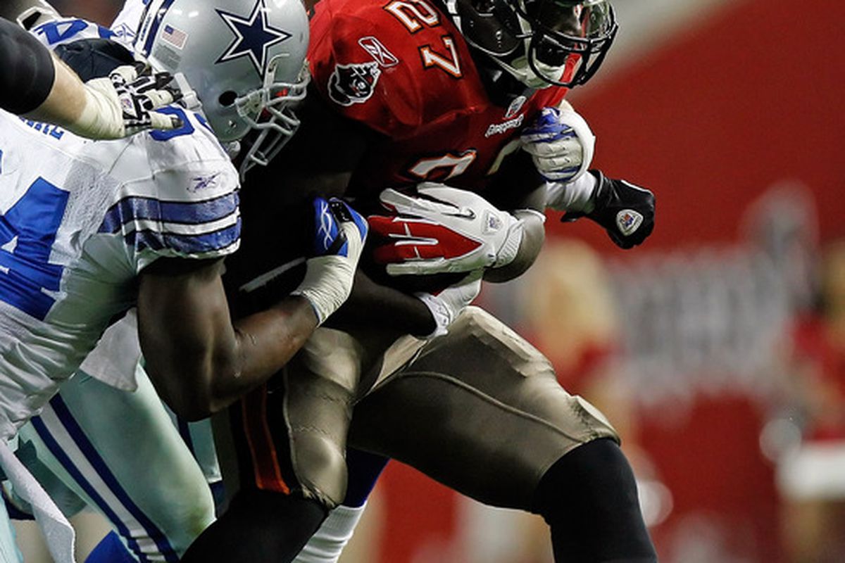 TAMPA, FL - DECEMBER 17:  Running back LeGarrette Blount #27 of the Tampa Bay Buccaneers runs the ball against the Dallas Cowboys during the game at Raymond James Stadium on December 17, 2011 in Tampa, Florida.  (Photo by J. Meric/Getty Images)
