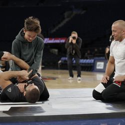 GSP gives some tips during UFC 217 workout session.