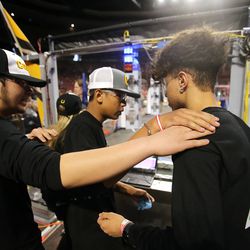 Abdul Ayubi, Aye Chan and Matheus Plinta prepare for a match as they and other students from Cottonwood High School compete in the First Robotics Competition Utah Regional event at the Maverik Center in West Valley City, Utah, on Friday, March 29, 2019.
