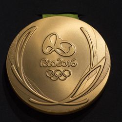 The Rio 2016 Olympic gold medal is presented during a ceremony at the Olympic Park in Rio de Janeiro, Brazil, Tuesday, June 14, 2016. Rio will host the Olympic games starting on Aug. 5.