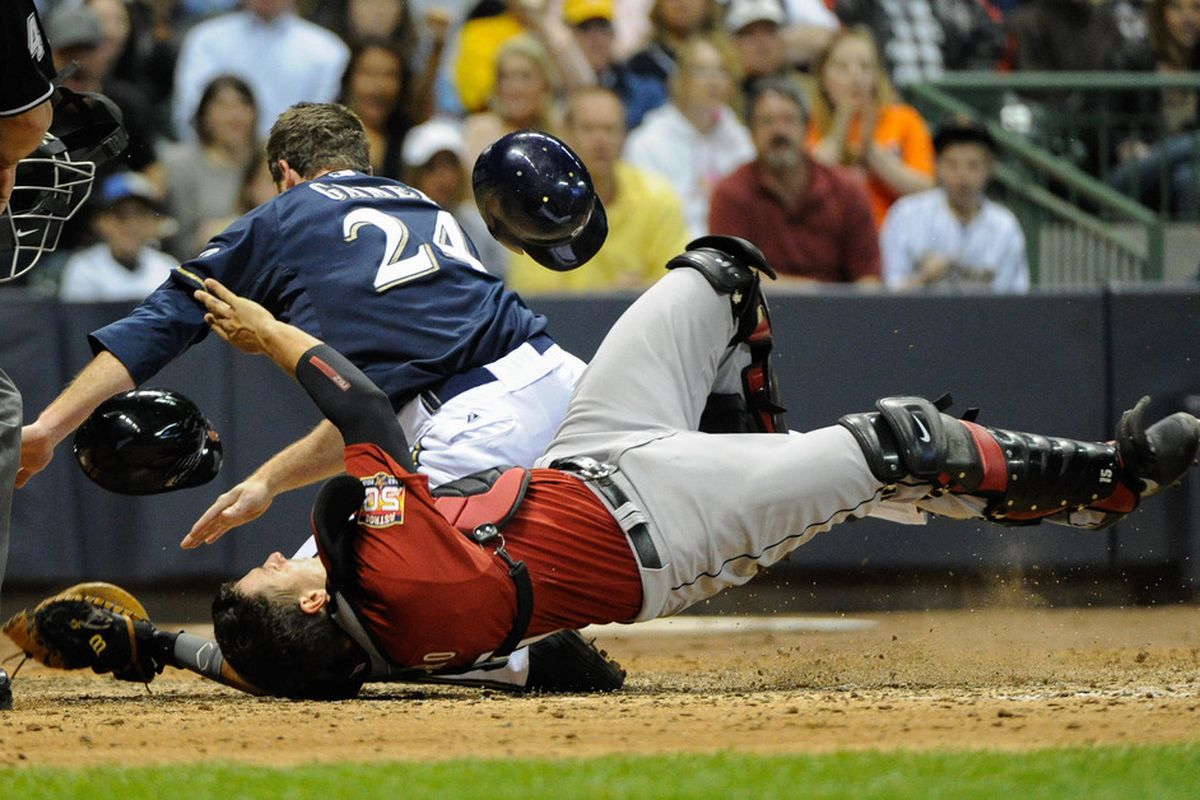 Milwaukee, WI, USA;   Houston Astros catcher Jason Castro (bottom) tags out Milwaukee Brewers first baseman Mat Gamel (24) in the sixth inning at Miller Park.  Mandatory Credit: Benny Sieu-US PRESSWIRE