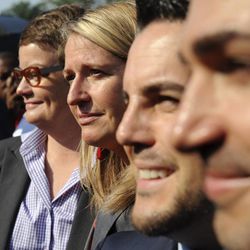 California's Proposition 8 plaintiffs, from left, Kris Perry, Sandy Steir, Jeff Zarrillo, and Paul Katami walk into the Supreme Court in Washington, Wednesday, June 26, 2013. The Supreme Court is meeting to deliver opinions in two cases that could dramatically alter the rights of gay people across the United States. The justices are expected to decide their first-ever cases about gay marriage Wednesday in their last session before the court's summer break. Hours before the court was to issue its rulings, crowds began lining up outside the Supreme Court building in hopes of getting a seat inside the courtroom.   (AP Photo/Cliff Owen)