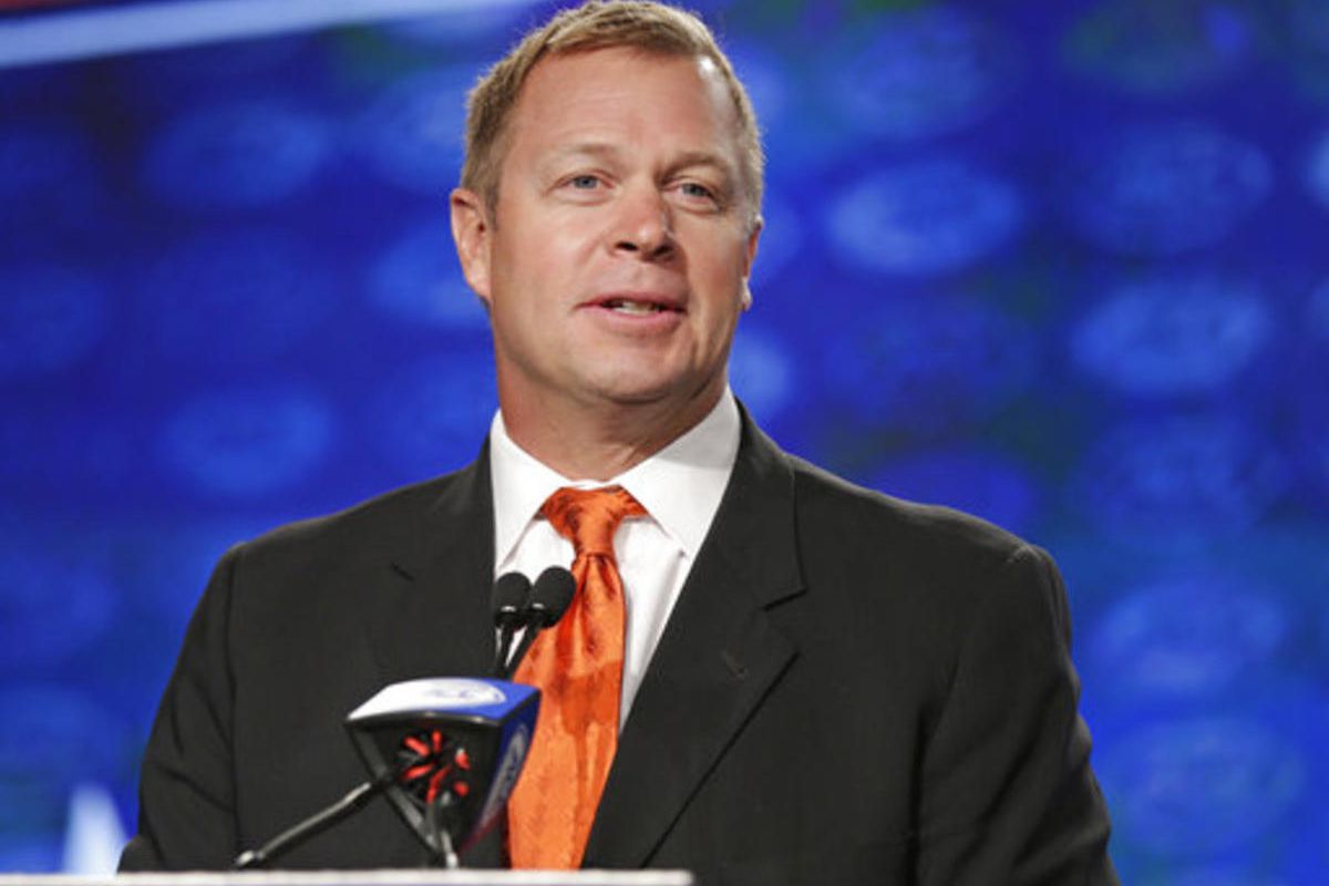 Virginia head coach Bronco Mendenhall speaks to the media during the Atlantic Coast Conference NCAA college football media day in Charlotte, N.C., Friday, July 14, 2017. (AP Photo/Chuck Burton)
