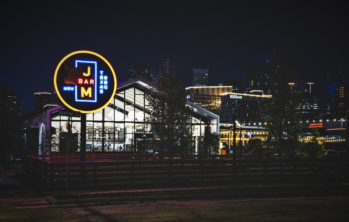A nighttime exterior of J-Bar-M Barbecue