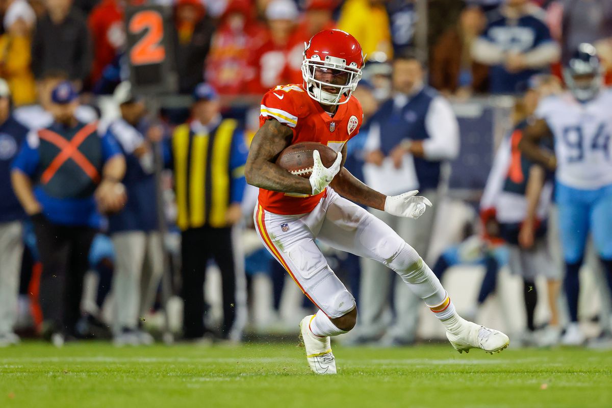 Mecole Hardman #17 of the Kansas City Chiefs runs after a fourth quarter pass catch against the Tennessee Titans at Arrowhead Stadium on November 6, 2022 in Kansas City, Missouri.