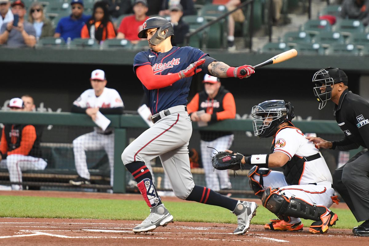 Carlos Correa #4 of the Minnesota Twins takes a swing during a baseball game against the Baltimore Orioles at Oriole Park at Camden Yards on May 5, 2022 in Baltimore, Maryland.