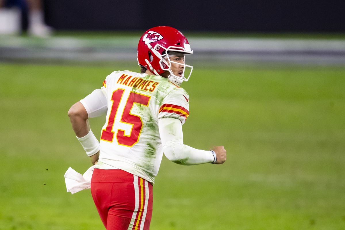 Kansas City Chiefs quarterback Patrick Mahomes (15) reacts after throwing the game winning touchdown in the closing seconds of the game against the Las Vegas Raiders at Allegiant Stadium.&nbsp;