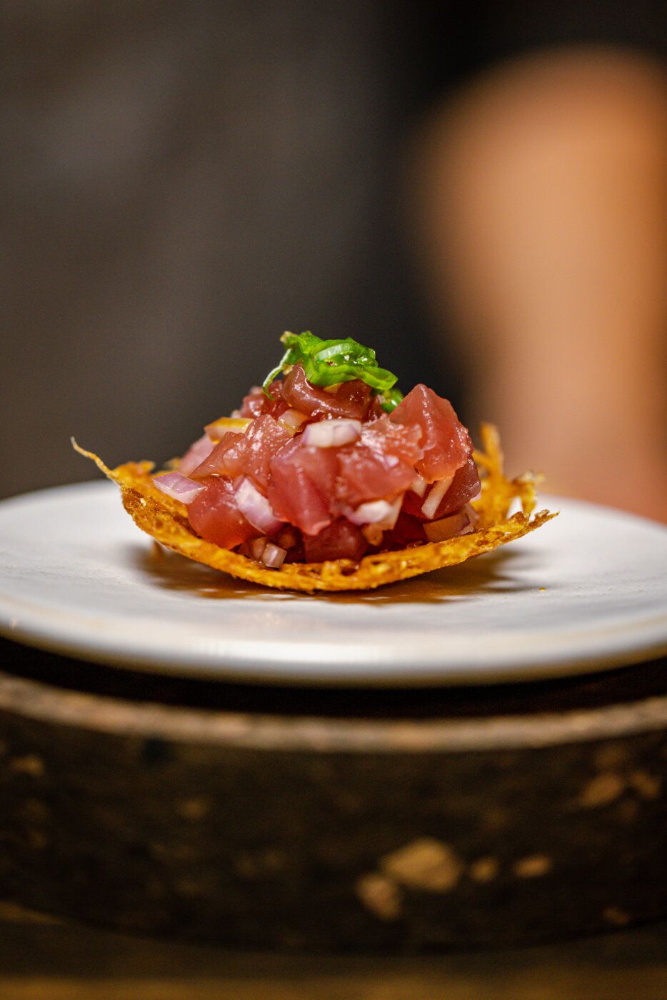 A crispy plate with diced tuna.