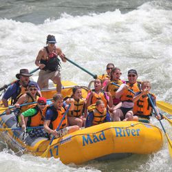 Members of the Heyborne family navigated the rapids of the Snake River in 2014. Kirby Heyborne is at the front of the raft on the left side and his father, Bruce, is second from the front on the right side. Kirby delights in retelling the story of falling in the river as a boy and having his father pull him out. "They are smarter than I was and they stay in the boat," he said. 
