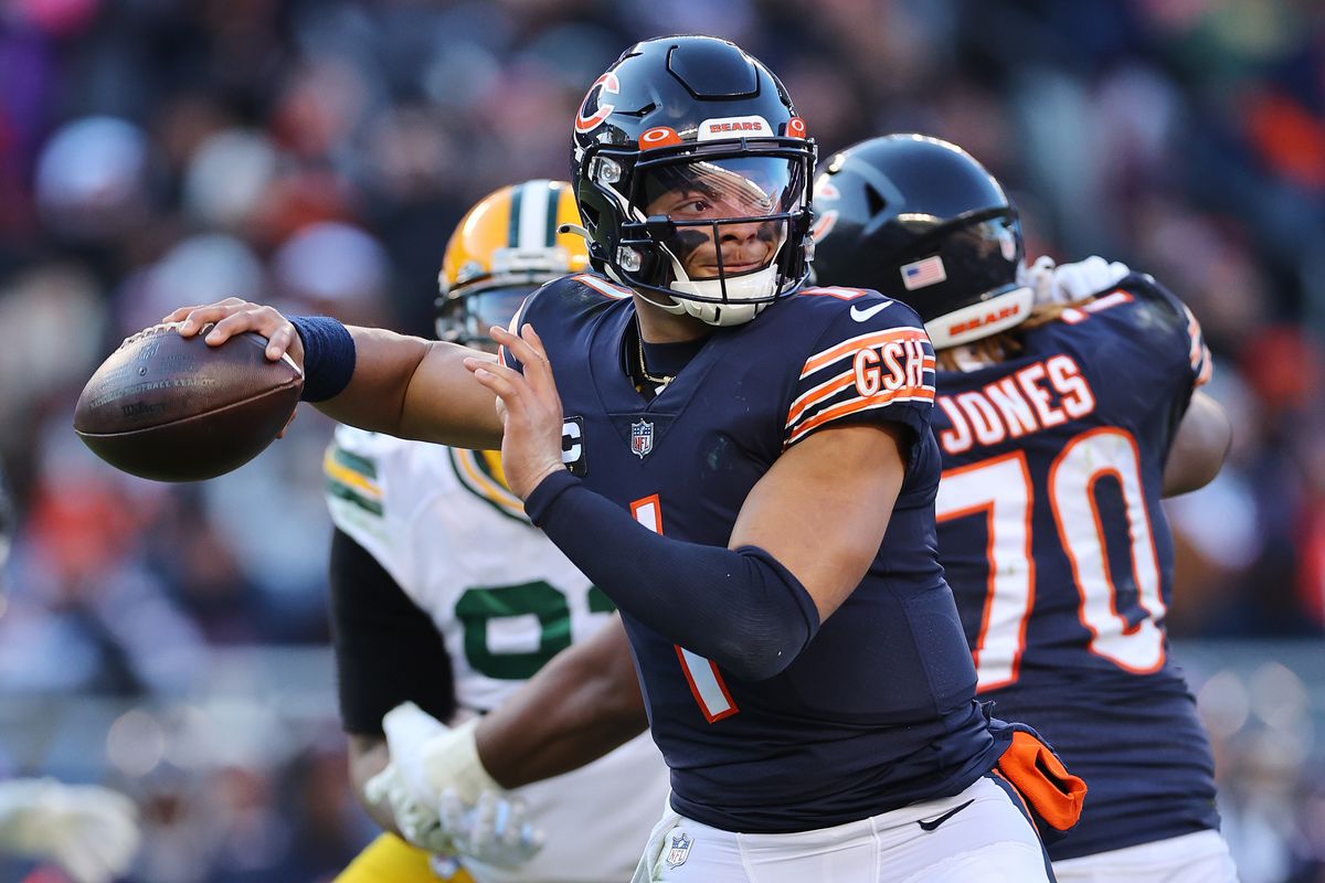 Justin Fields #1 of the Chicago Bears throws a pass against the Green Bay Packers at Soldier Field on December 04, 2022 in Chicago, Illinois.