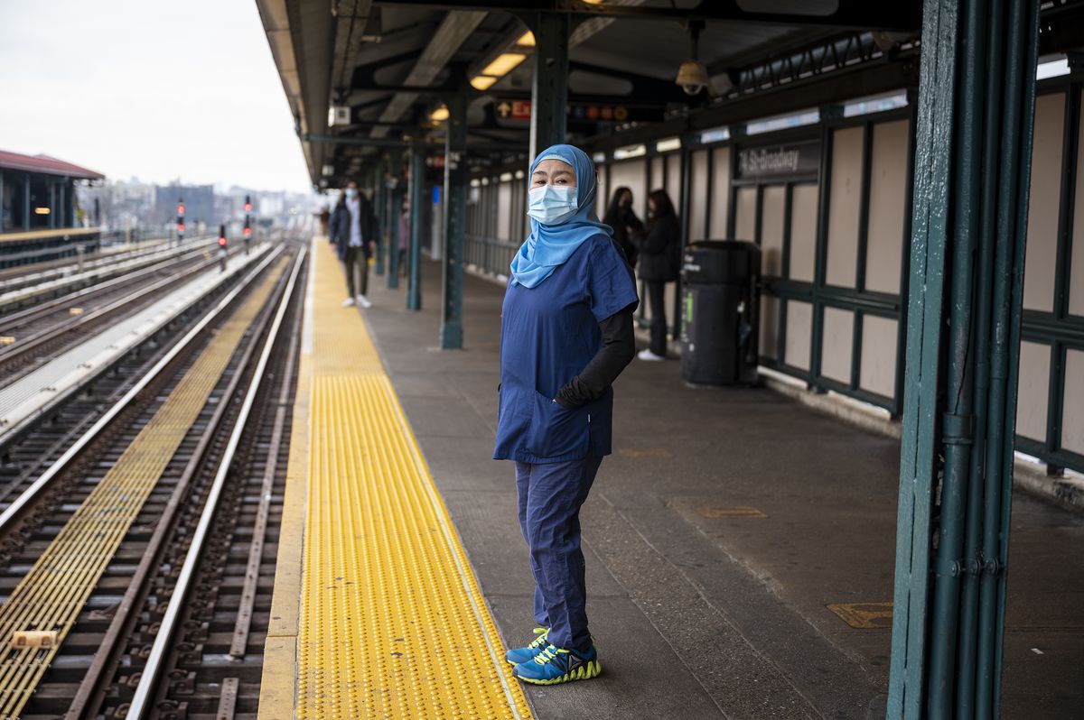 Potri Ranka Manis, 67, in her work scrubs at the 74th St.-Roosevelt Ave. station in Queens.