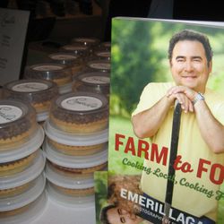 Emeril's table advertised his latest book and offered miniature pecan pies.