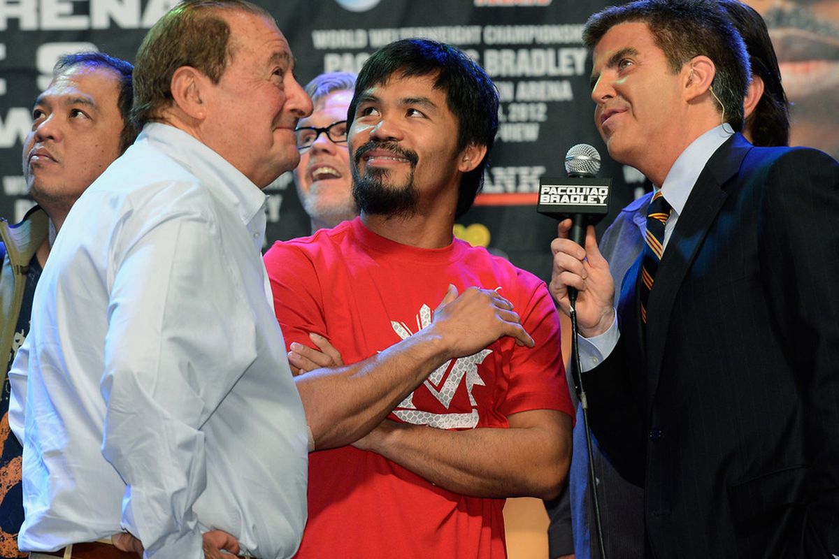 Bob Arum says it's preposterous to think Top Rank had anything to do with Manny Pacquiao losing, and that Manny will have to choose between Timothy Bradley and Juan Manuel Marquez for November. (Photo by Kevork Djansezian/Getty Images)