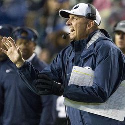 Brigham Young offensive coordinator Ty Detmer calls a play during an NCAA college football game against Utah State in Provo on Saturday, Nov. 26, 2016. Brigham Young defeated in-state foe Utah State 28-10.