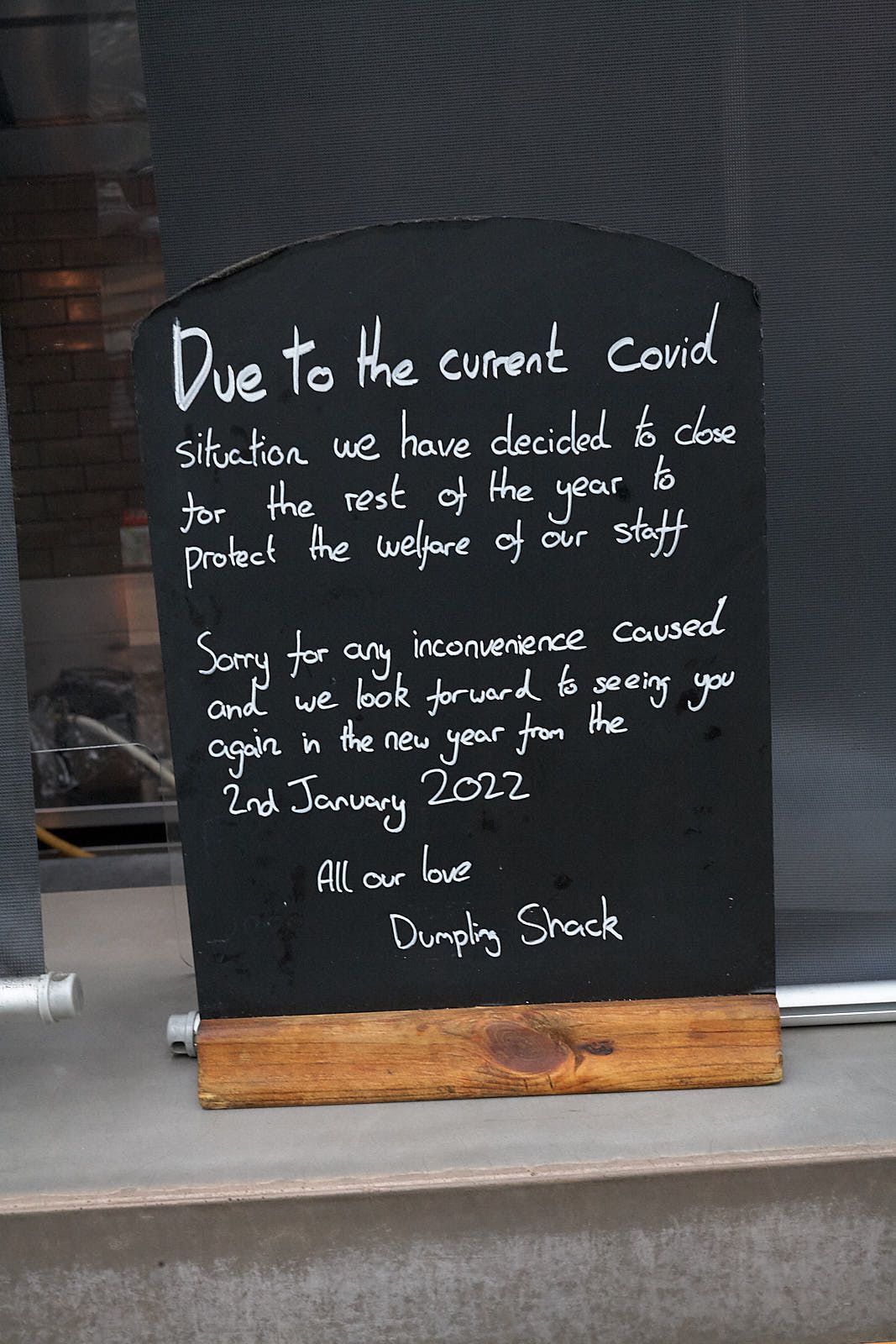 Dumpling Shack’s sign in Spitalfields spells out the reason behind its early closure 