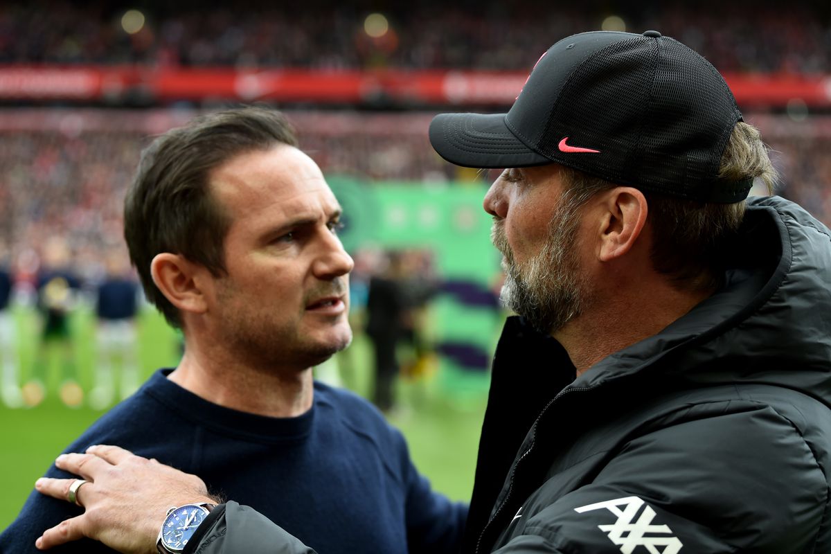 Jurgen Klopp manager of Liverpool with Everton’s manager Frank Lampard the Premier League match between Liverpool and Everton at Anfield on April 24, 2022 in Liverpool, England.