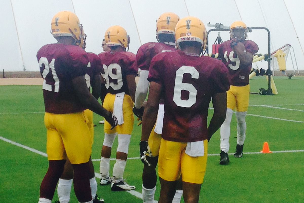 Wide receiver Ellis Jefferson finishes up a drill as Jaelen Strong, Cameron Smith and Fred Gammage wait their turn