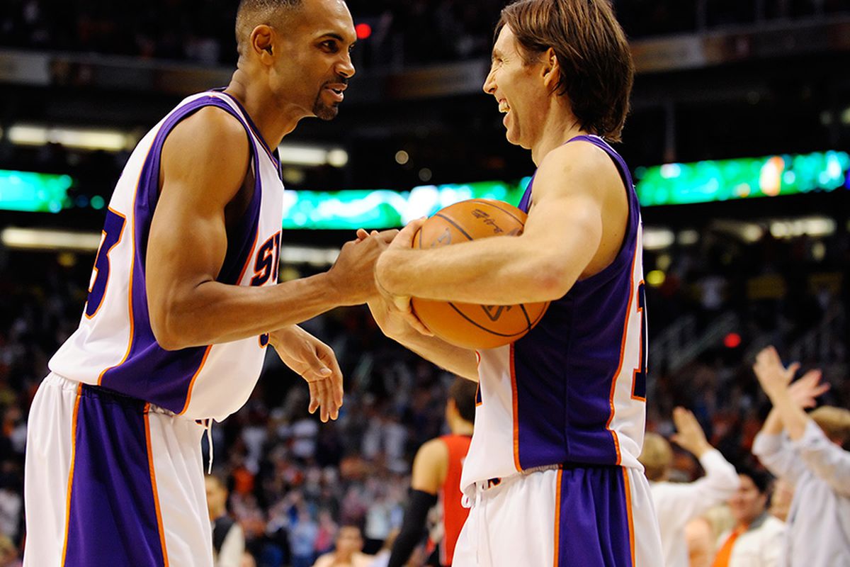 Grant Hill & Steve Nash celebrate after beating the Toronto Raptors on Sunday night. (Photo by Max Simbron)