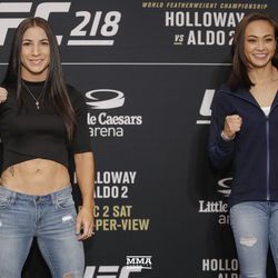 Tecia Torres and Michelle Waterson pose at UFC 218 media day.