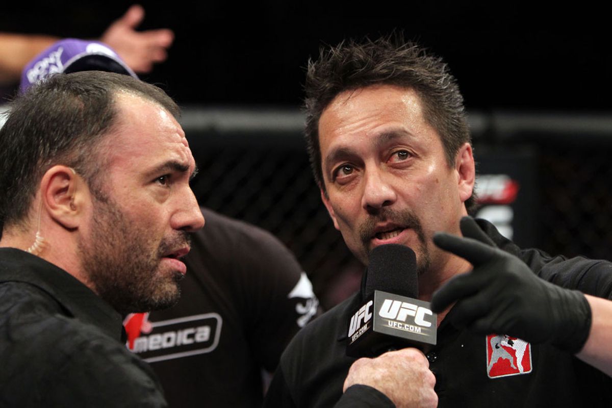 Referee Mario Yamasaki (right) explains his decision for stopping the welterweight bout between Erick Silva and Carlo Prater during UFC 142 on Jan. 14 in Rio de Janeiro, Brazil. Photo by Josh Hedges via Zuffa LLC/Getty Images.