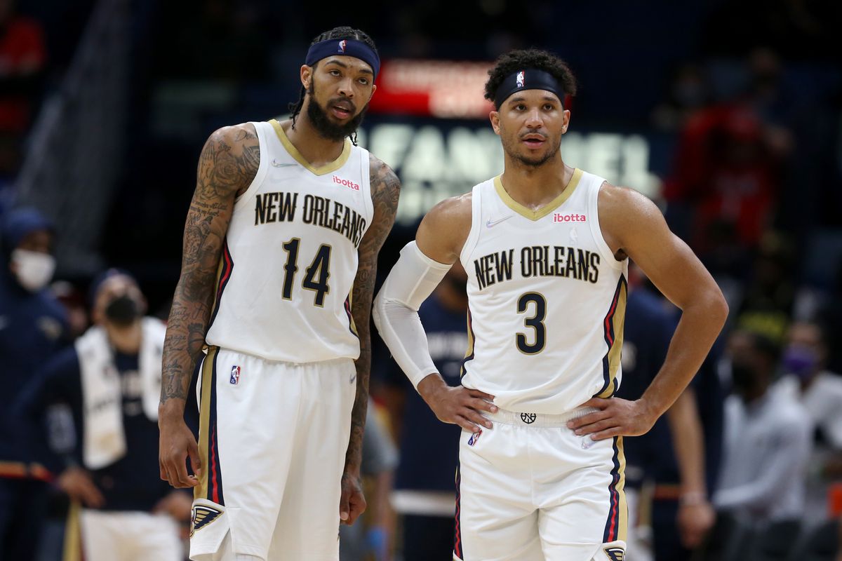 New Orleans Pelicans forward Brandon Ingram (14) and guard Josh Hart (3) talk in the second half against the Golden State Warriors at the Smoothie King Center. 