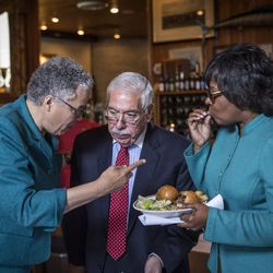 Then Cook County Democratic Chairman Joe Berrios, center, talks with County Board President Toni Preckwinkle and Ald. Michelle Harris at a party meeting in 2016. File Photo. | Rich Hein/Sun-Times 