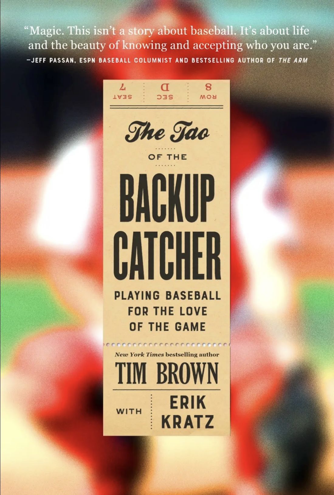 This is the book’s cover. It has a blurred photo of a catcher — presumably Kratz — wearing read catching great. The book’s title appears in a beige box superimposed over the photo. The box is shaped like a ticket stub. 