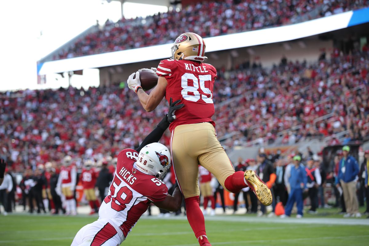 George Kittle #85 of the San Francisco 49ers makes a 6-yard touchdown catch during the game against the Arizona Cardinals at Levi’s Stadium on November 7, 2021 in Santa Clara, California. The Cardinals defeated the 49ers 31-17.