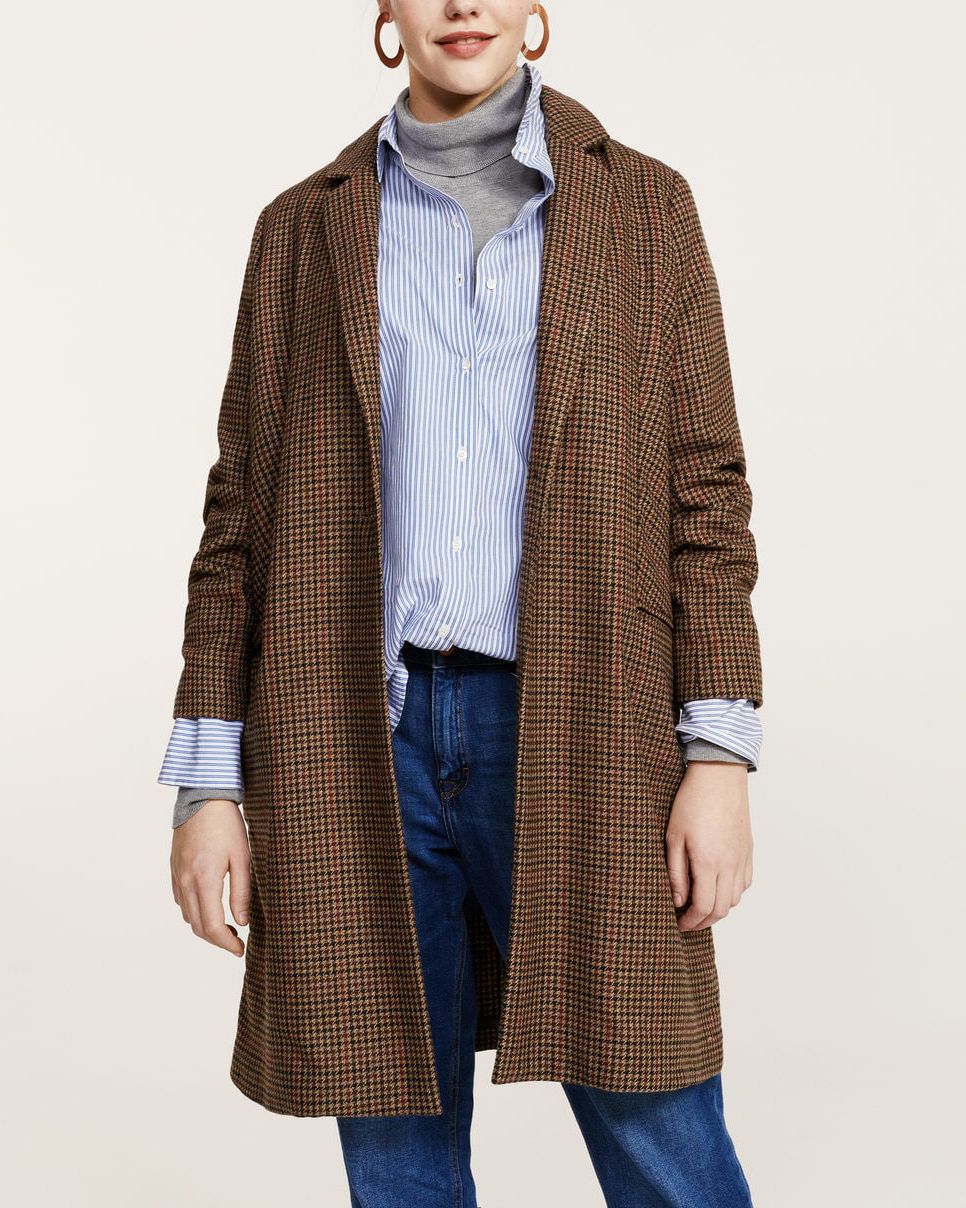 A brown houndstooth coat