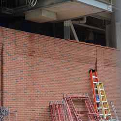 3:40 p.m. The bottom of the elevator shaft under the left-field video board - 