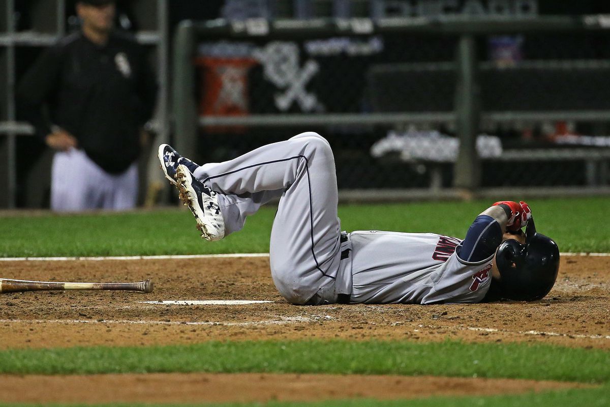 Micahel Martinez uses a foul off his foot as an excuse to wallow on the ground about the Tribe's playoff hopes