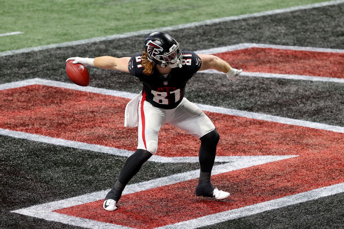 Hayden Hurst #81 of the Atlanta Falcons celebrates after scoring a 7 yard touchdown against the Tampa Bay Buccaneers during the third quarter in the game at Mercedes-Benz Stadium on December 20, 2020 in Atlanta, Georgia.