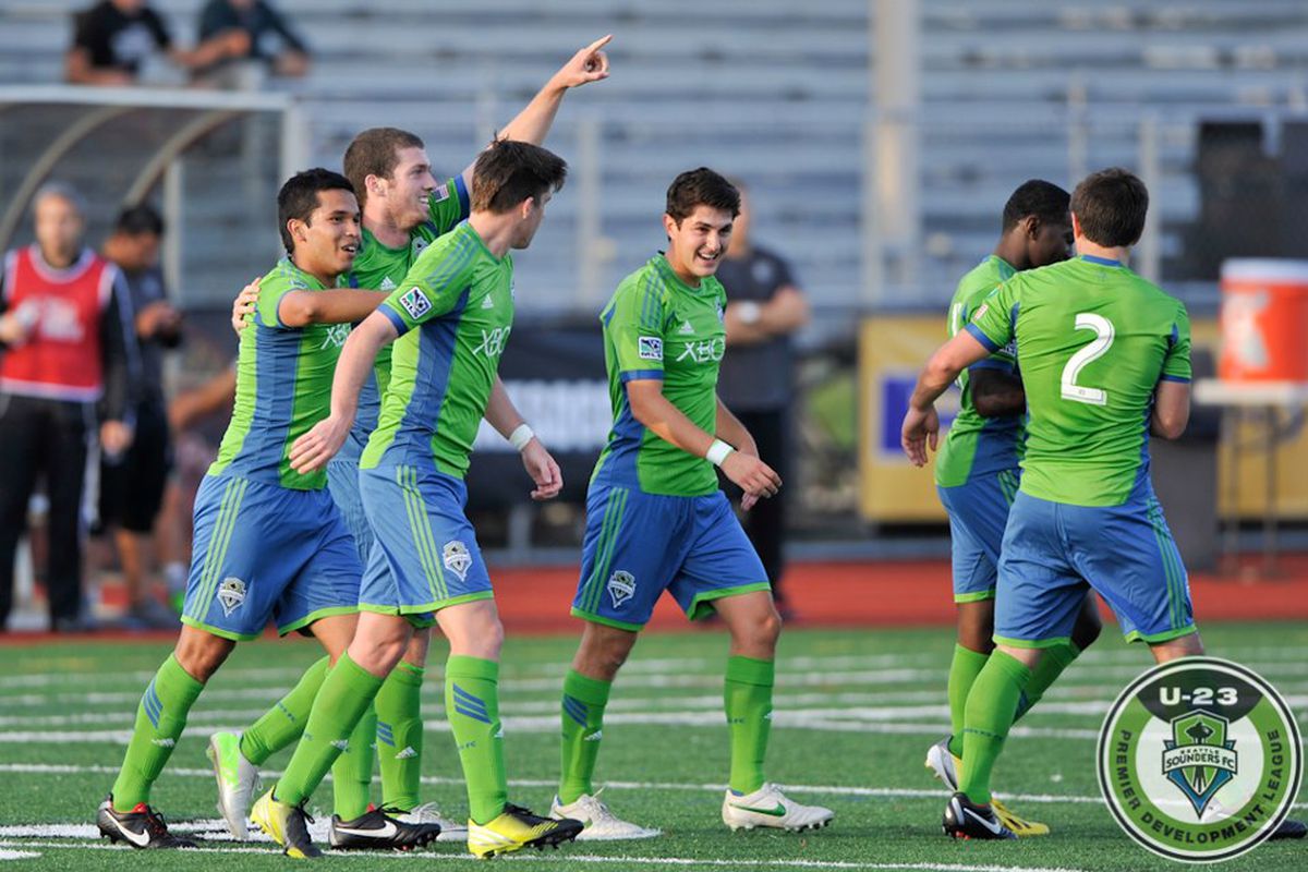 David Geno (second from left) celebrates a goal.
