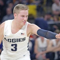 Utah State sophomore guard Sam Merrill gears up to play defense against the University of Providence during the Aggies' exhibition game on Nov. 3 at the Spectrum in Logan.