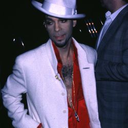 Prince in a loose look to celebrate Emancipation going double platinum in 1996.